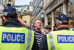 Right wing fascist supporter shouts at polic shouting